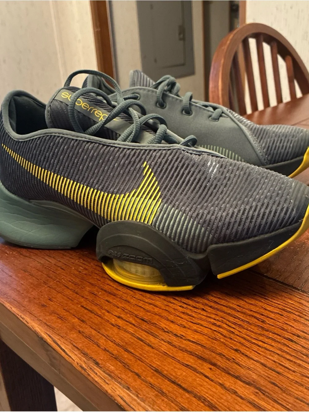 Nike Men’s Gray Athletic Shoes with Yellow Swoosh